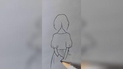 拿花的女孩背影简笔画。